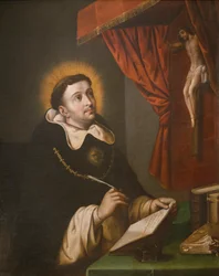 St. Thomas Aquinas writing before the crucifix